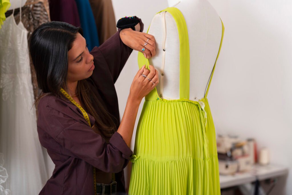 medium shot brazilian woman working as clothing designer
